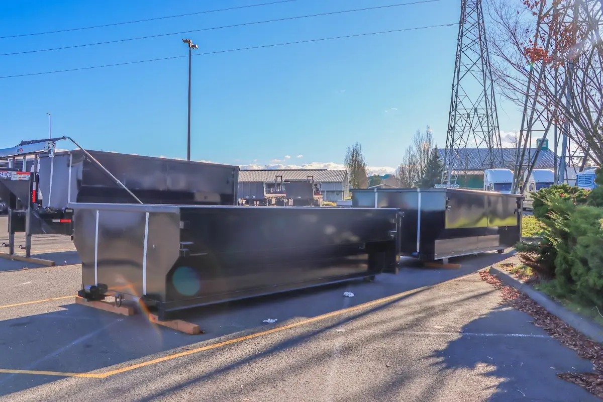 Roll-off dumpster ready for waste disposal at job site for 2 Yard Dumpster Rental in Airmont